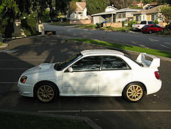 2005 Subaru Impreza WRX STi Aspen White with Gold BBS Wheels S. CA-left-side.jpg