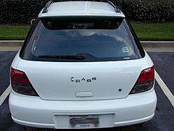 Debadging:  How bad does white fade?-itchy.jpg