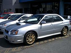 Can someone post a pic of an '04 silver STI with gold wheels-imgp0821.jpg