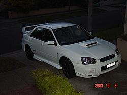 Can i see some pics of STI's on black wheels-dsc02362-small-.jpg