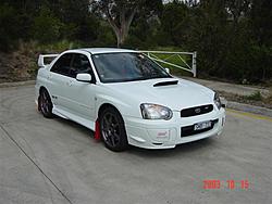 Can i see some pics of STI's on black wheels-dsc02415-small-.jpg