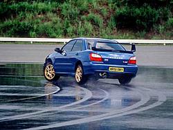 Sti Wing on Non STI anyone have pix-rear.jpg
