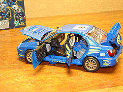 check out my new wrc sti it will kill an evo-smoke-doors-open.jpg