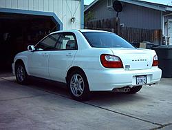 My Aspen White 2002 WRX Sedan-rear-driver-side-3-27-04-resized-.jpg