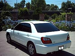 My Aspen White 2002 WRX Sedan-rear-driver-side-7-3-04-resized-.jpg