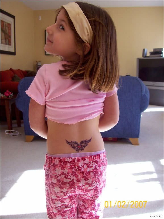 Name:  Little_tramp_stamp.jpg
Views: 13
Size:  62.2 KB